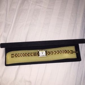 Gold watch, square face